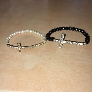 Two stretchy bracelets with rhinestone cross and beads